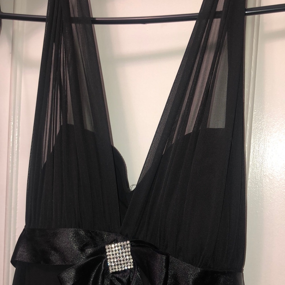 Black Dress size 8 fits me and I’m a 4 never ever worn.
